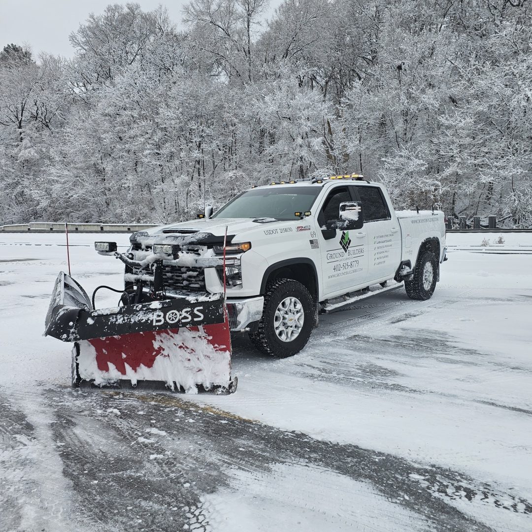 Residential snow removal by Ground Builders Landscaping in Omaha